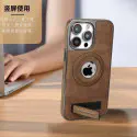 Mattel MagSafe JINDUKA  Stand Logo Hole Leather Case PU Leather Electroplated Bezel Case.