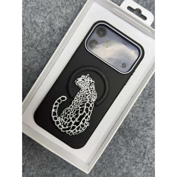 premium leather-texture phone case featuring an elegant embroidered leopard design